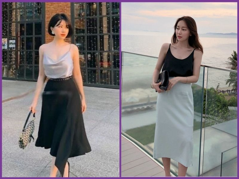 Cô gái diện áo hai dây đen và chân váy chữ A dáng dài màu trắng, tạo vẻ ngoài cuốn hút và quyến rũ