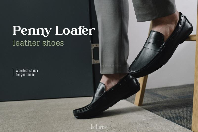 Một đôi giày lười nam Penny Loafer màu nâu đỏ