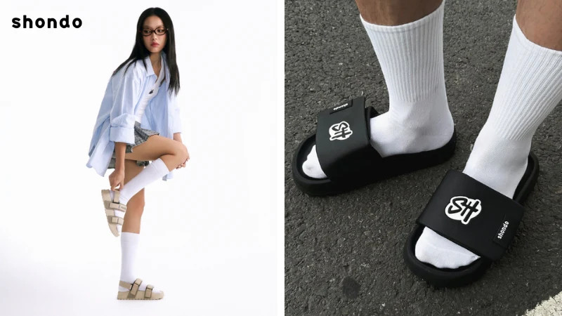 Bàn chân đang thử một đôi giày thể thao mới với tất